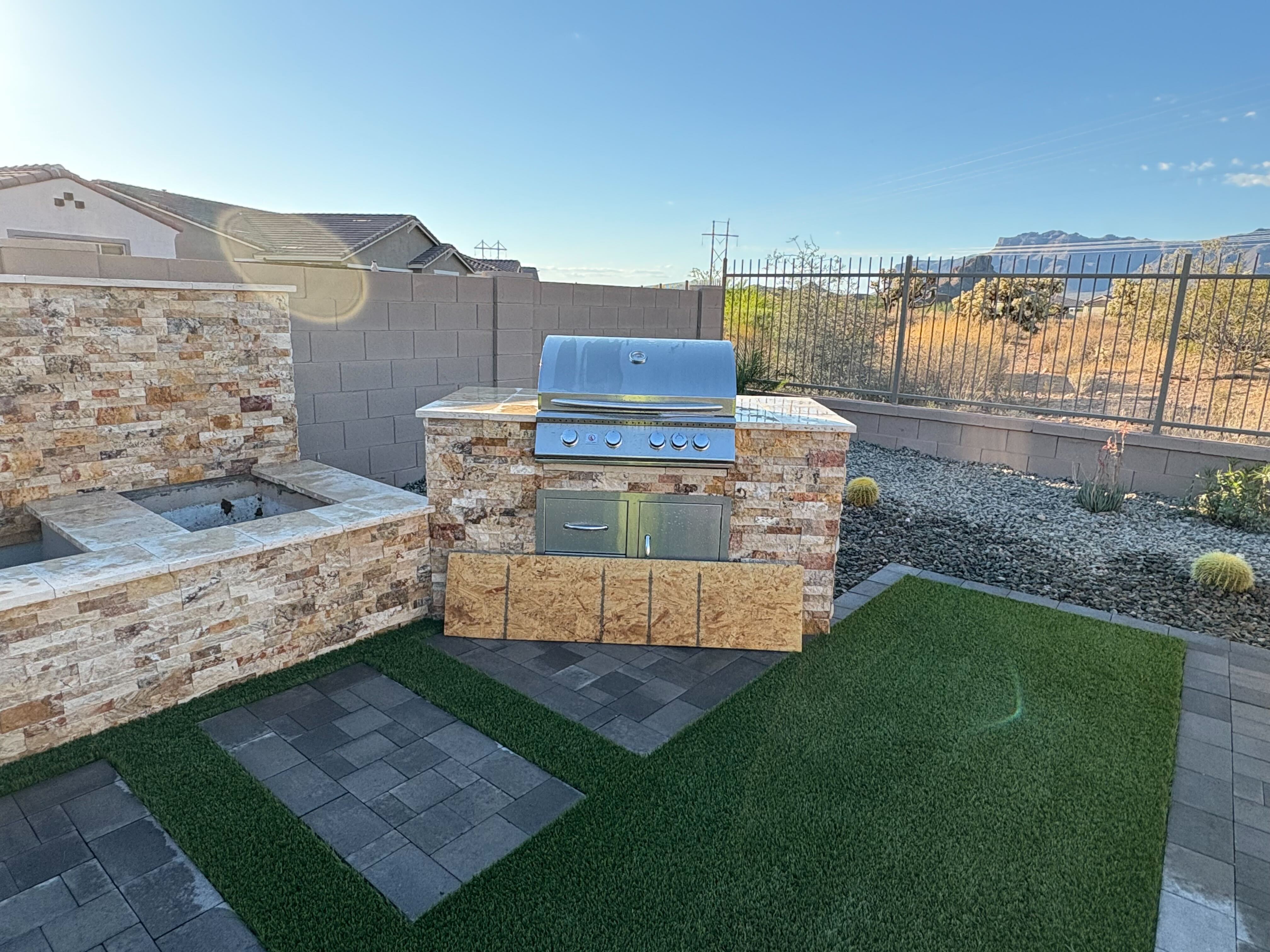 Built-in grill station with stainless steel storage in Arizona
